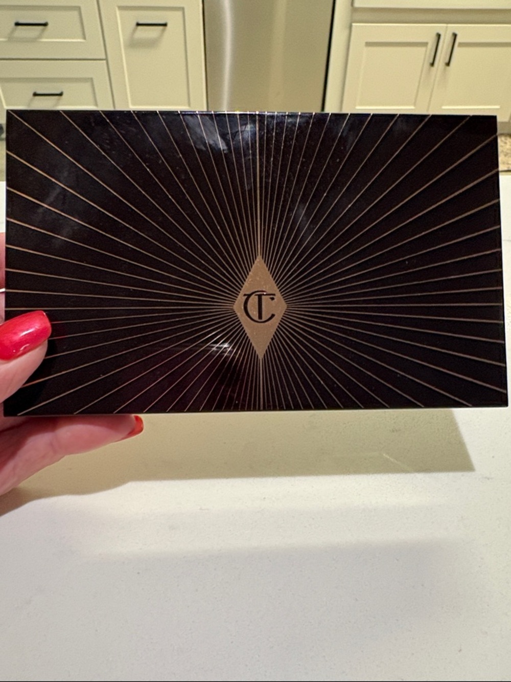 Charlotte Tilbury Dark Brown Eyeshadow Palette with Gold Detailing